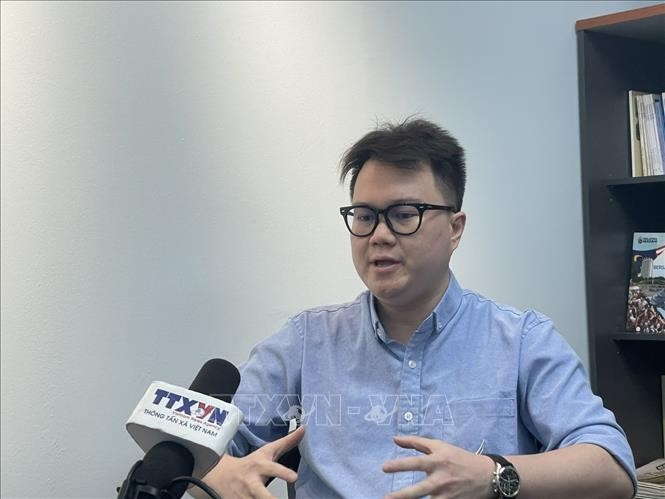 Enzo Sim Hong Jun, a Malaysian researcher specialising in Southeast Asian history and defence, grants an interview to the Vietnam News Agency. (Photo: VNA)