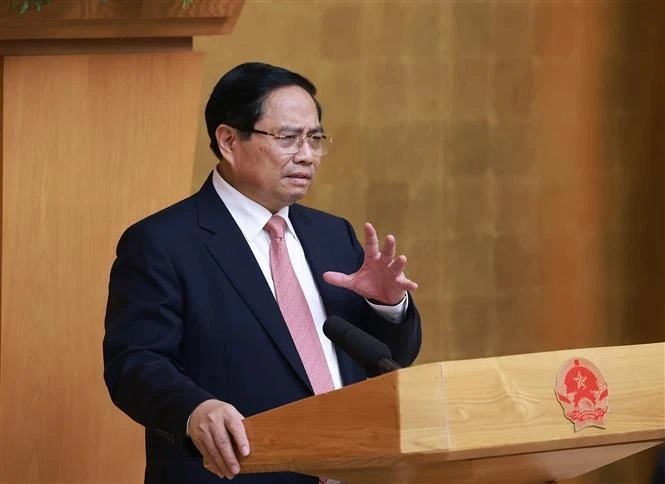 Prime Minister Pham Minh Chinh addresses the meeting (Photo: VNA)