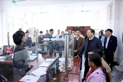 Secretary of the Party Committee of Lai Chau province Le Minh Ngan inspects two-tier local administration model (Photo: VNA)