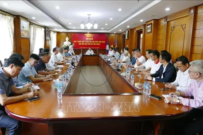 At the conference held in Vientiane on November 6 to collect feedback on the draft documents for the 14th Party Congress. (Photo: VNA)