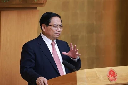 Prime Minister Pham Minh Chinh addresses the meeting (Photo: VNA)
