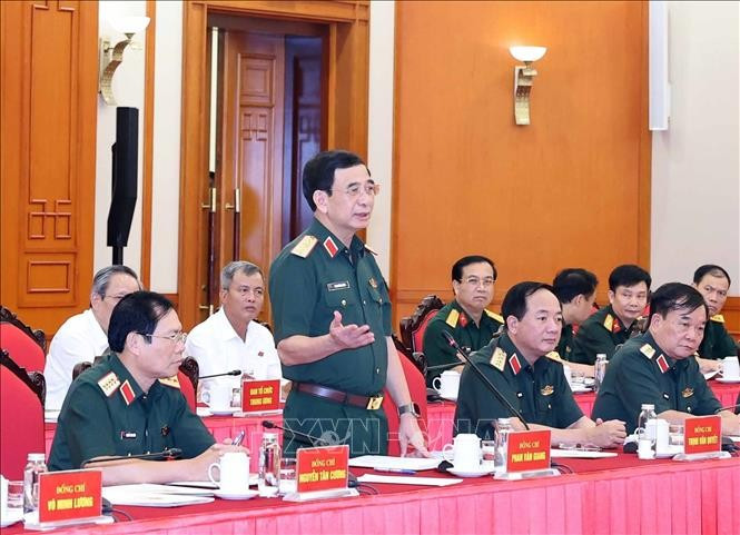 General Phan Van Giang, Deputy Secretary of the Central Military Commission and Minister of National Defence, speaks at the working session. (Photo: VNA) phan-van-giang.jpg