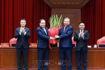 The 14th Party Central Committee unanimously elects To Lam, General Secretary of the 13th Party Central Committee, to continue serving as the Party chief for the 14th tenure. Photo: VNA)