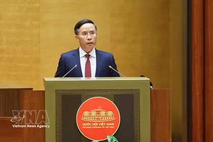 SBV Governor Pham Duc An presents a proposal on a draft law amending and supplementing a number of articles of the Law on the State Bank of Vietnam, the Law on Anti-Money Laundering, and the Law on Credit Institutions at the 16th National Assembly’s first extraordinary session on August 5 (Photo: VNA)