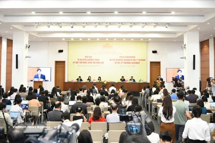At the press briefing on the 16th National Assembly's first session in Hanoi on April 3. (Photo: VNA)