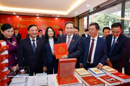 NA Chairman Tran Thanh Man (centre) at the book launch in Hanoi on February 24. (Photo: VNA)