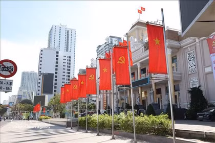 Flags and banners are lavishly displayed in front of the Khanh Hoa provincial People’s Committee headquarters. (Photo: VNA)