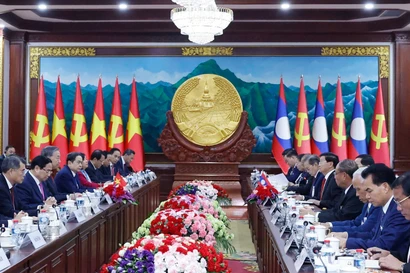 At the talks between General Secretary of the Communist Party of Vietnam Central Committee To Lam and General Secretary of the Lao People’s Revolutionary Party Central Committee and President of Laos Thongloun Sisoulith. (Photo: VNA)
