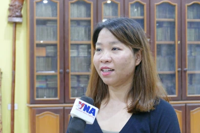Nguyen Thi Thu Huyen, Chief of the Office of the Association of Vietnamese People in Vientiane, grants an interview to the Vietnam News Agency (Photo: VNA)