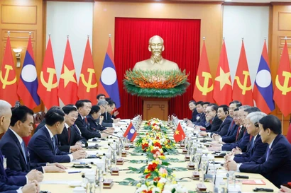 At the talks between General Secretary of the Communist Party of Vietnam Central Committee To Lam and General Secretary of the Lao People’s Revolutionary Party Central Committee and President of Laos Thongloun Sisoulith. (Photo: VNA)