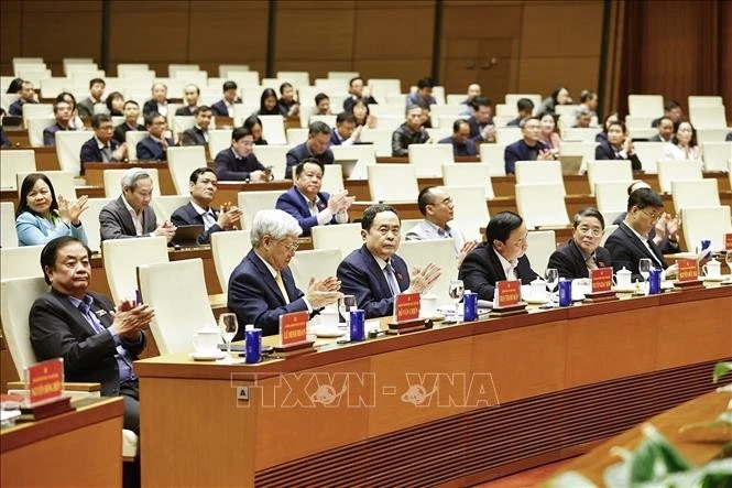 Politburo member, Secretary of the NA Party Committee and NA Chairman Tran Thanh Man (front, centre) and other officials at the briefing on the 14th National Party Congress's outcomes on January 26. (Photo: VNA)