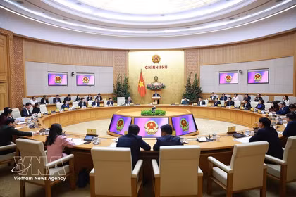 Prime Minister Pham Minh Chinh on February 22 chairs a meeting of the Government’s standing members to review Tet celebrations and implement key task for the post-holiday period. (Photo: VNA) 