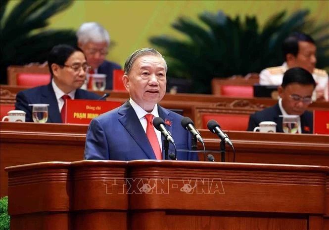 General Secretary of the Communist Party of Vietnam To Lam presents the report at the 14th National Party Congress. (Photo: VNA)