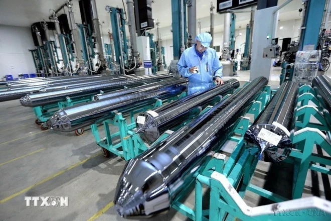 Manufacturing materials for solar panel production at JA Solar Vietnam Co., Ltd., a Hong Kong (China)-invested enterprise, at Quang Chau Industrial Park in Bac Giang province. (Photo: VNA)