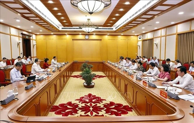 At a working session between the Politburo’s working group and the standing board of the Lai Chau provincial Party Committees. (Photo: VNA)
