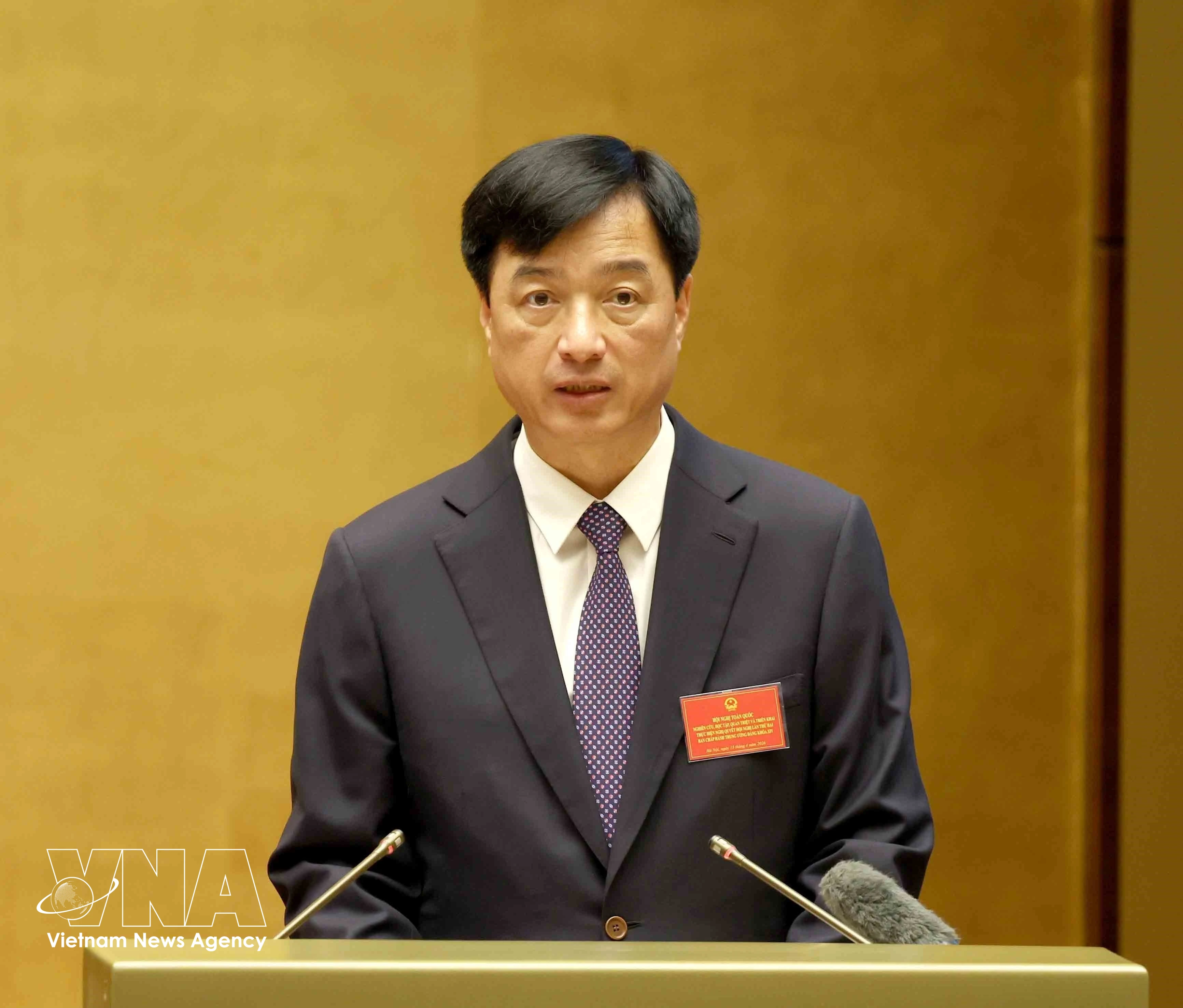 Politburo member, Secretary of the Party Central Committee and Chairman of its Organisation Commission Nguyen Duy Ngoc speaks at the national conference to disseminate and implement the resolution of the second meeting of the 14th Party Central Committee. (Photo: VNA)