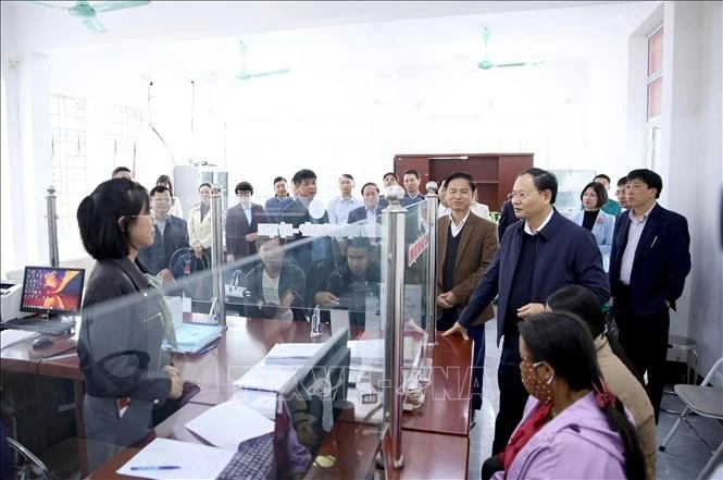 Secretary of the Party Committee of Lai Chau province Le Minh Ngan inspects two-tier local administration model (Photo: VNA)