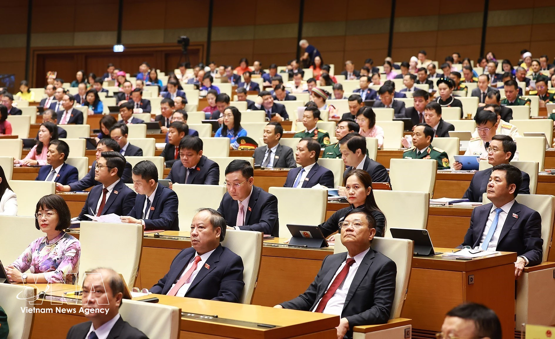 Deputies at the first session of the 16th NA (Photo: VNA)