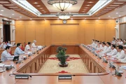 Politburo member and State President Luong Cuong (second from left) chairs the meeting with the Standing Board of the Phu Tho Party Committee on September 8. (Photo: VNA)