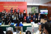 PM Pham Minh Chinh visits the press centre of the 14th National Party Congress on January 20. (Photo: VNA)
