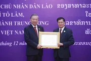 Lao National Gold Order presented to Vietnamese Party General Secretary To Lam